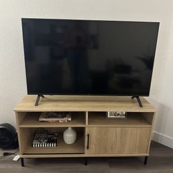 Room essentials TV stand (Brand New) With 44 Inch LG TV 