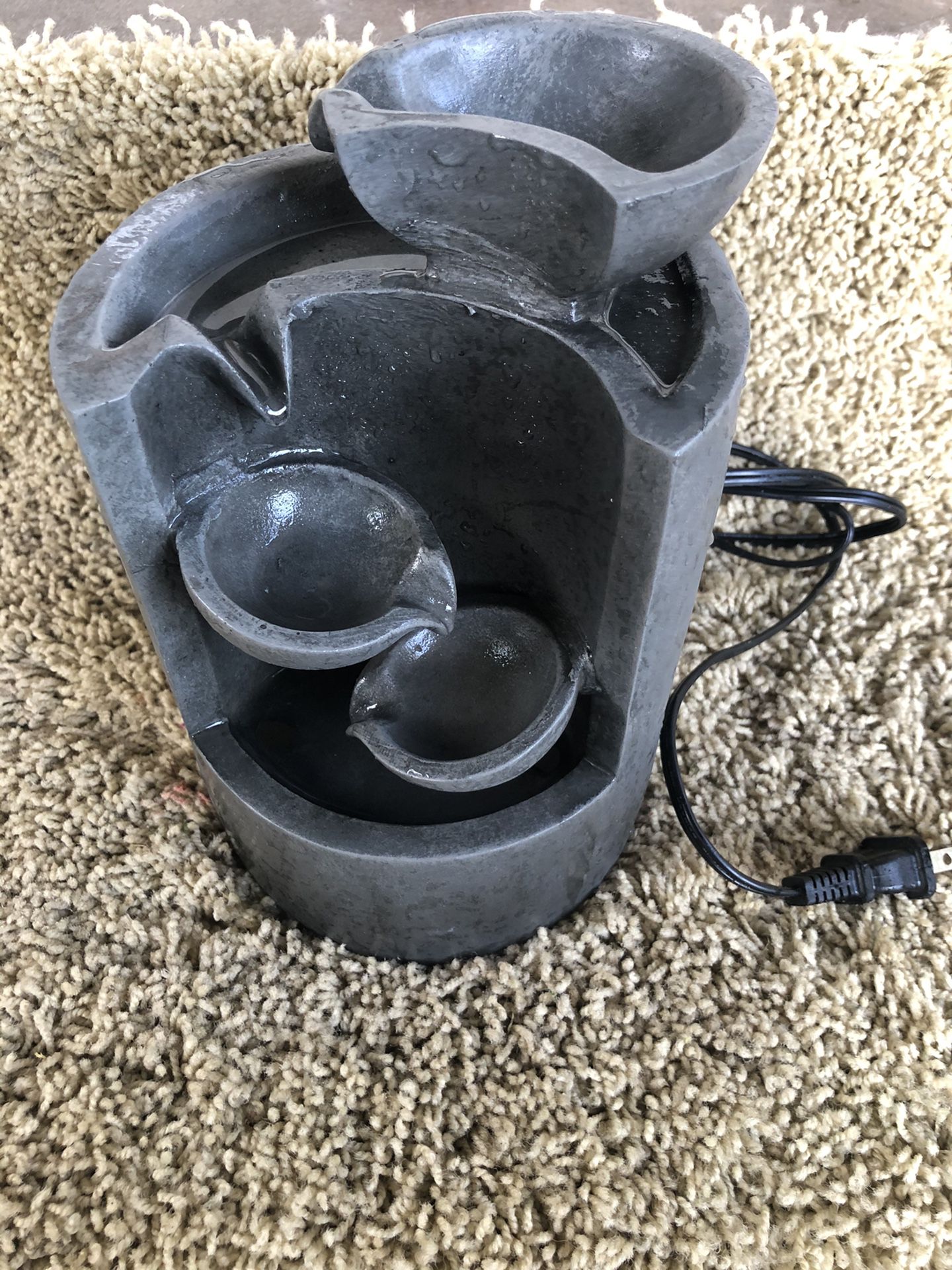 Small electric grey water fountain