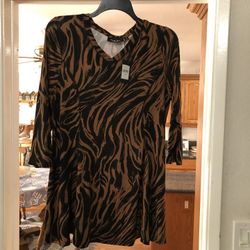 Women’s Tunic length Size 16 Top 3/4  Sleeve Length .  Made of 95% Viscose and 5% Elastane.  Brand new perfect condition.  With tags.  By Arna York.  