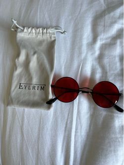 Red tinted sunglasses