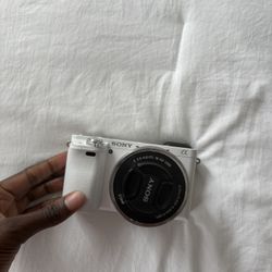 Sony a6000 digital camera with tripod