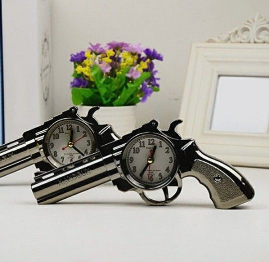 Hand gun desk clock