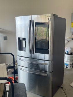 Refrigerator and washer and dryer