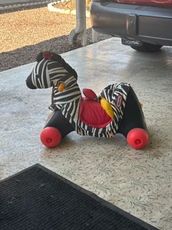 Toy Riding Zebra