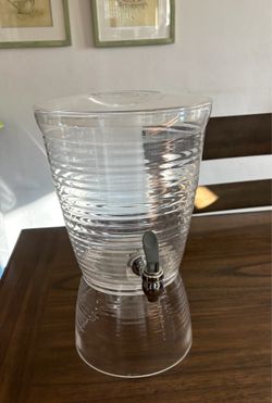 Clear plastic beverage dispenser