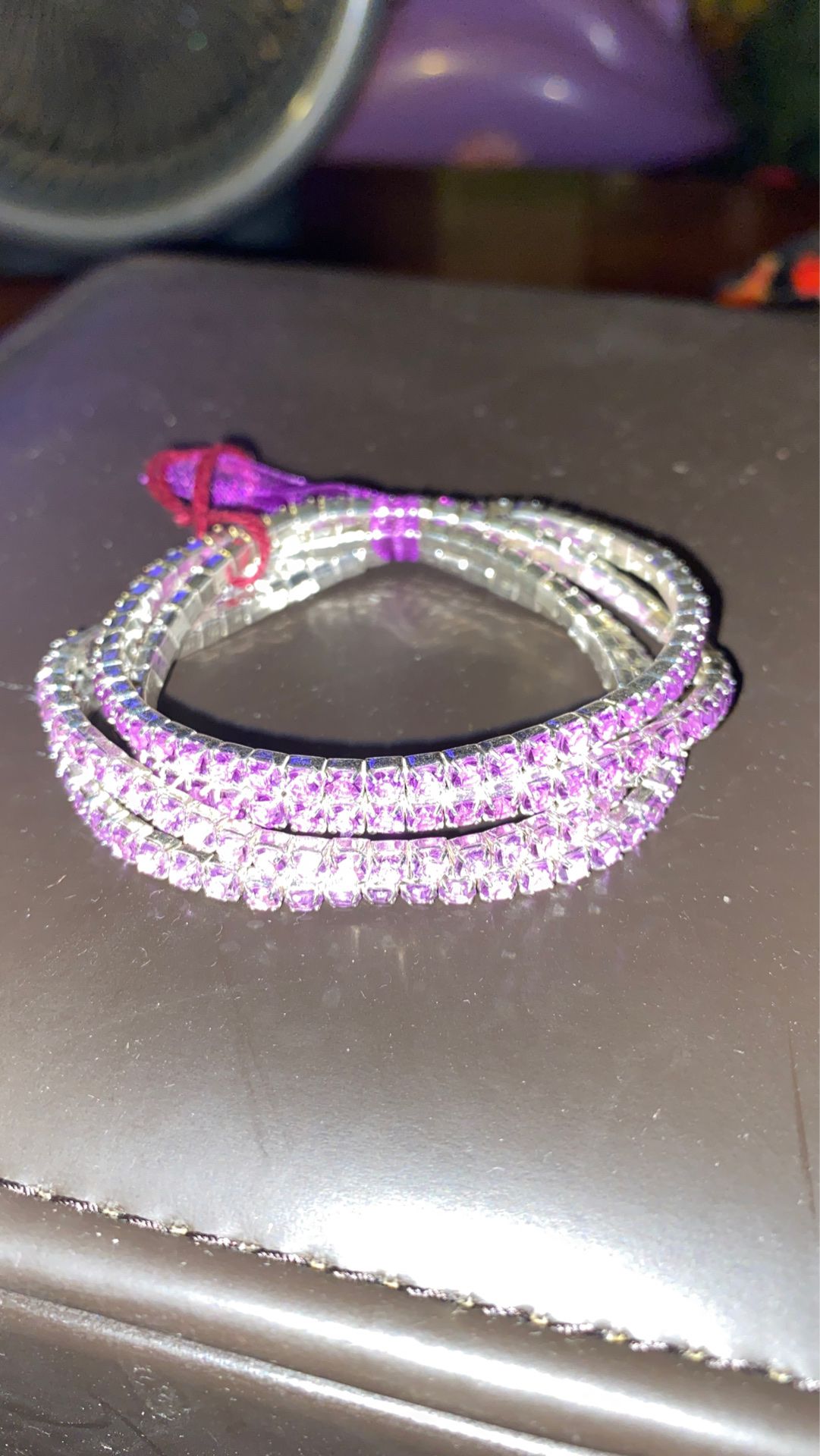 4 purple bracelets 2 light purple 2 dark purple
