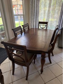 Dinning table with side table.