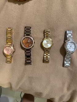 4 Watches (2 Michael Kors, 1 Vivienne, Westwood, and 1 guess watch) $140 for all 4 (cash only)