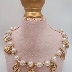 Seashell and faux pearl necklace