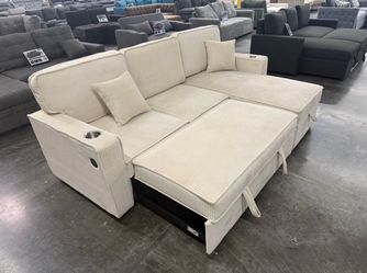 Ivory sleeper sofa with reversible storage chaise