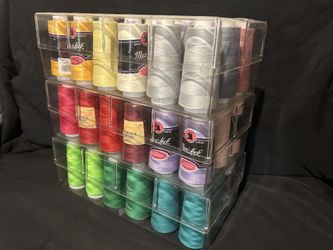 Multiple brands Of Interlocking And Polyester Thread.