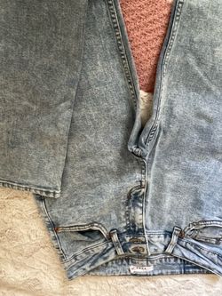 S.O.N.G  Light Washed Baggy Flared Jeans.