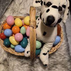 Dalmatian stuff dog with easter eggs and wicker basket included