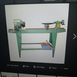 Wood Lathe With A Set Of Chizles And Extras