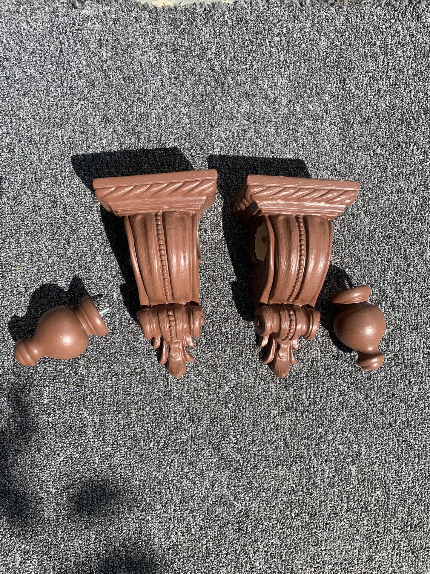 Curtain rod holders.