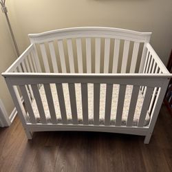 6-in-1 Convertible Crib by Delta Children With Mattress