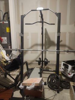 Squat rack with weights.