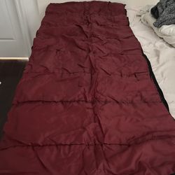Red Sleeping Bag with Plaid Interior