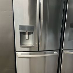 NEW OPEN BOX GE FRENCH STYLE STAINLESS STEEL REFRIGERATOR 