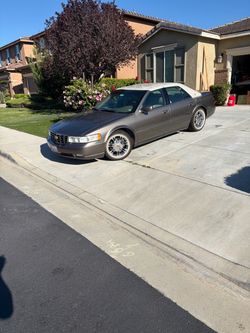 2003 cadi sls gold package
