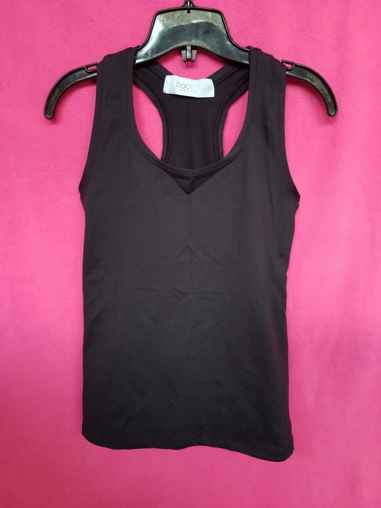 WOMEN'S SPORT BLOUSE SIZE M/L ( has compression in the stomach area )