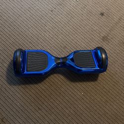 Blue Hoverboard With Charger And Has  Bluetooth  100 Or Name A Fair Price