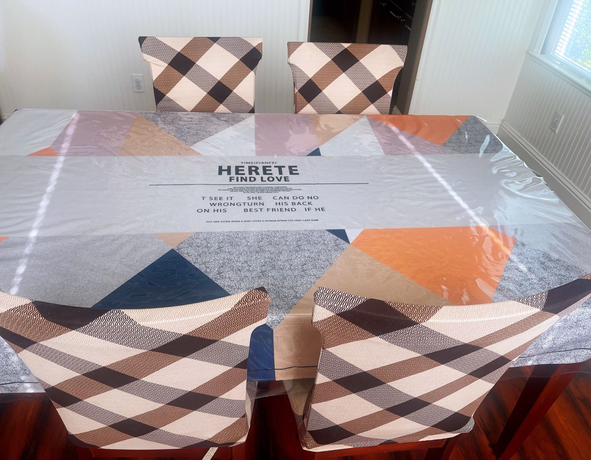 Dining table and four chairs with two covers