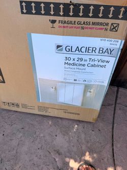 white Glacier Bay 30" x 29" framed Tri-View medicine cabinet