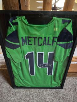 DK Metcalf signed seahawks jersey with display