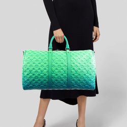 Authentic Louis Vuitton Keepall XS Taurillon Illusion bag