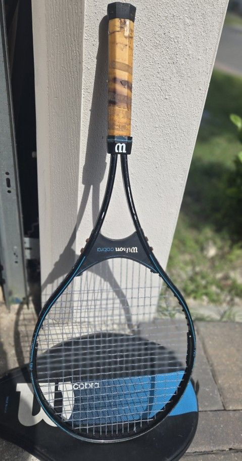 Vintage Wilson Cobra tennis racket.