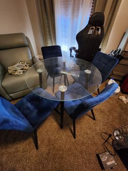 Glass table with 4 chairs