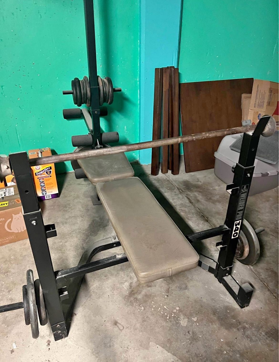 Disassembled Weider 340 Bench and Lat pulldown with weight holders