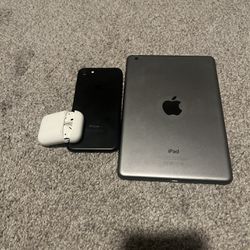 Lot Of 3 - iPhone 7, iPad Mini 2 And AirPods