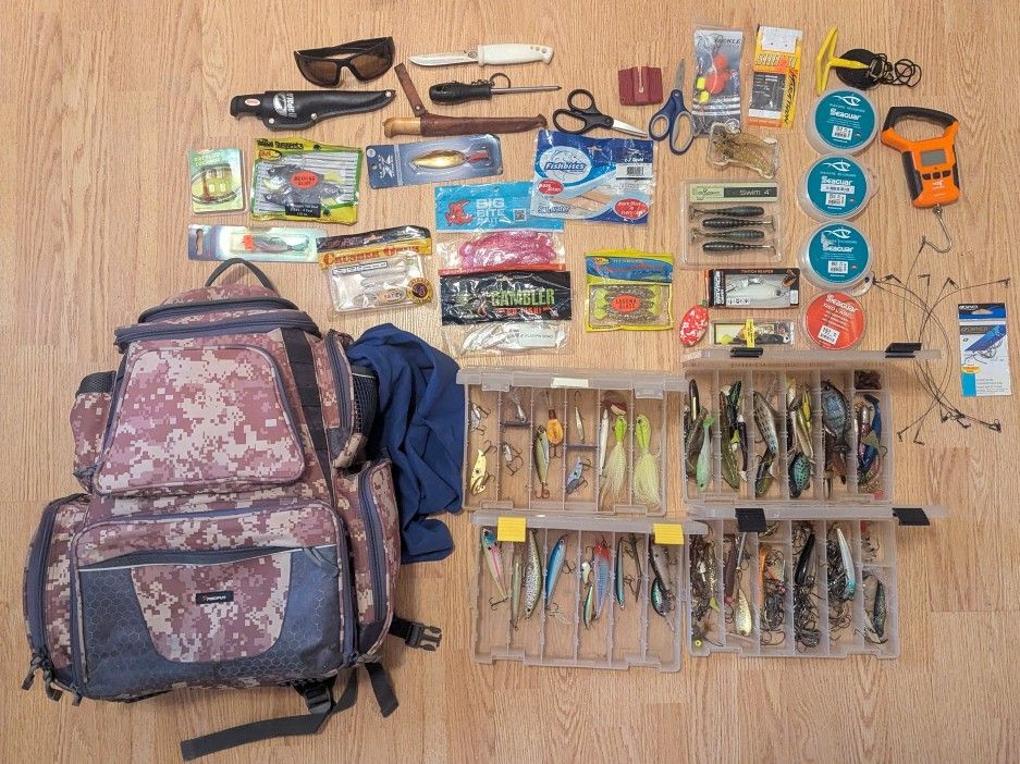 tackle backpack full of fishing gear and lures