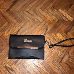 Gu cci wristlet