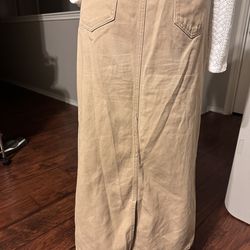 Long skirt, with a back slit, light brown color, size L.