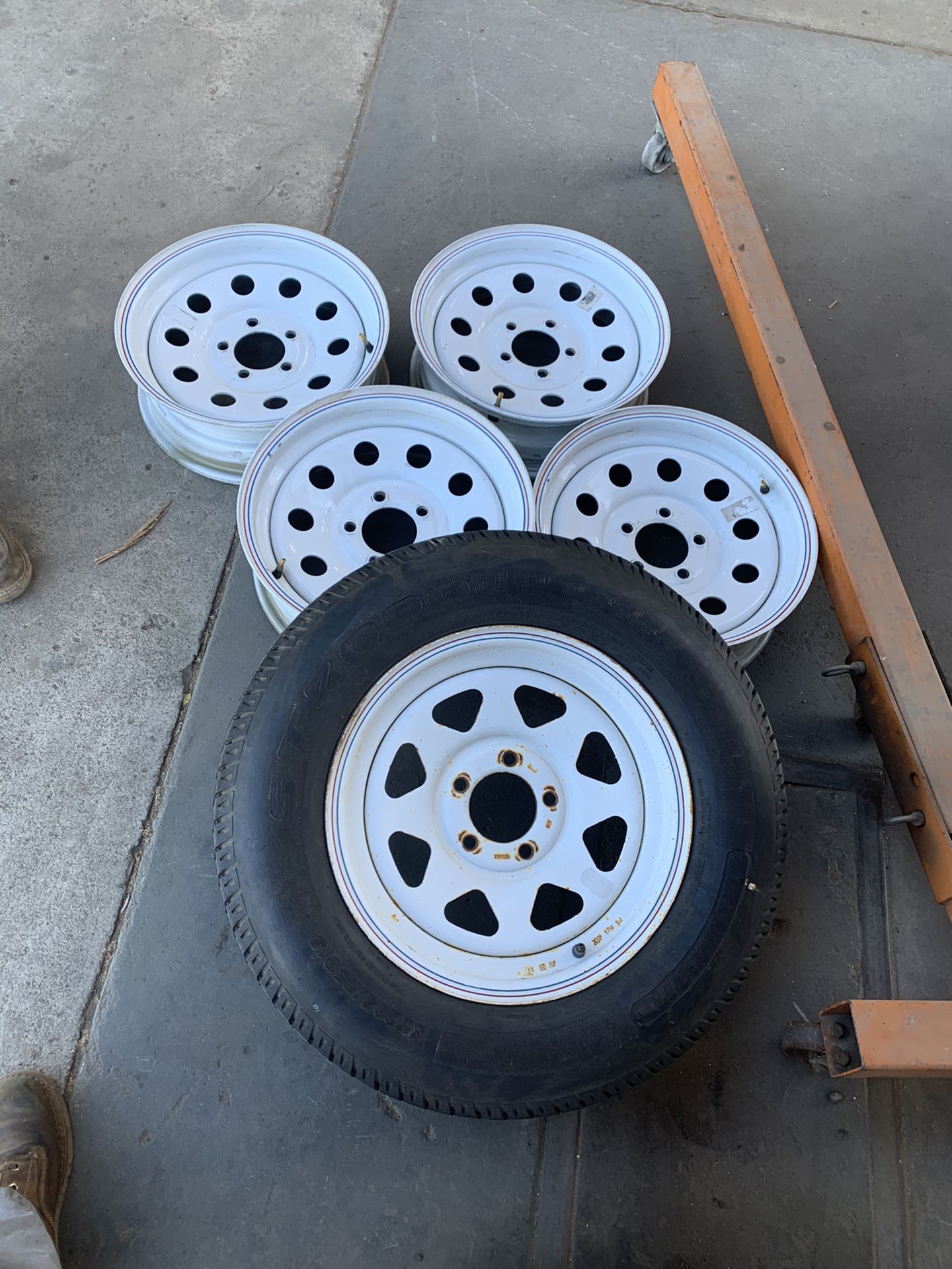 Trailer rims and one spare