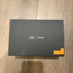 Oakley Meta Black and Gold Sunglasses