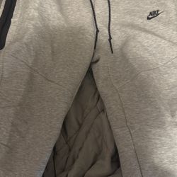 grey nike tech pants (new)