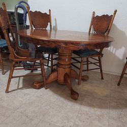 Oakwood Dining Set, Pedestal Table, 6 Pressed back chairs