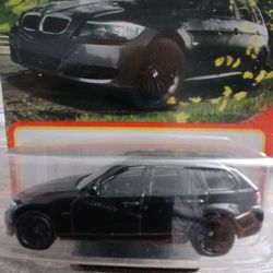 Matchbox 2012 BMW 3 Series Touring Wagon diecast car, specifically item number 58/100