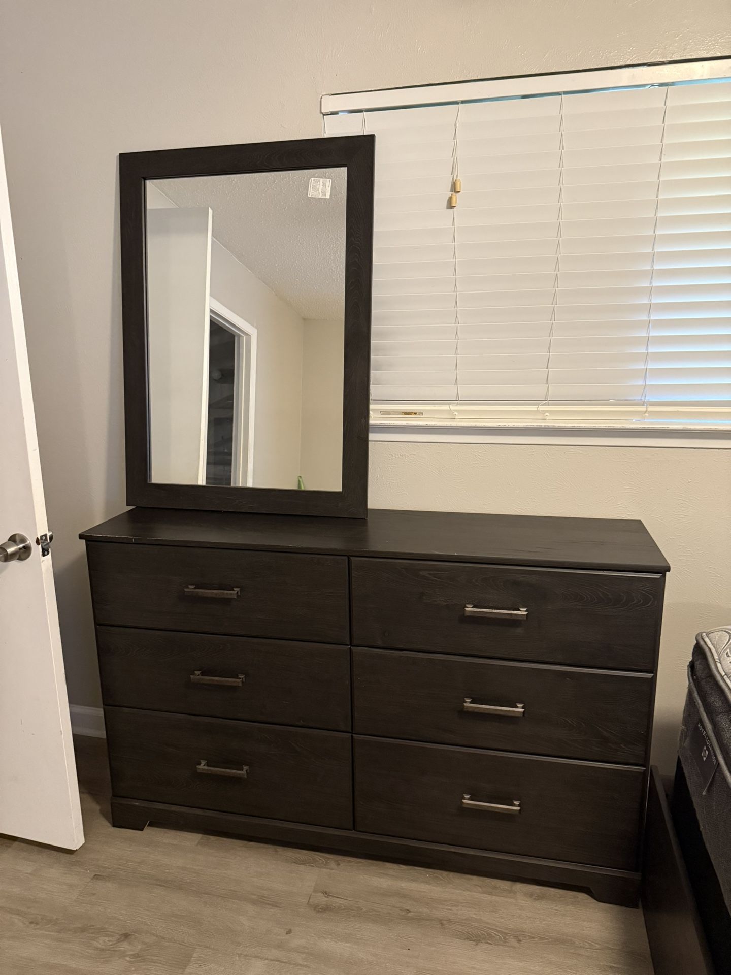 Bedroom With Mattress And Dresser 