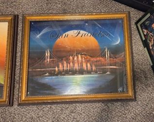 Two 16" x 20" gold Michael's frames