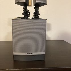 Three Bose Speakers