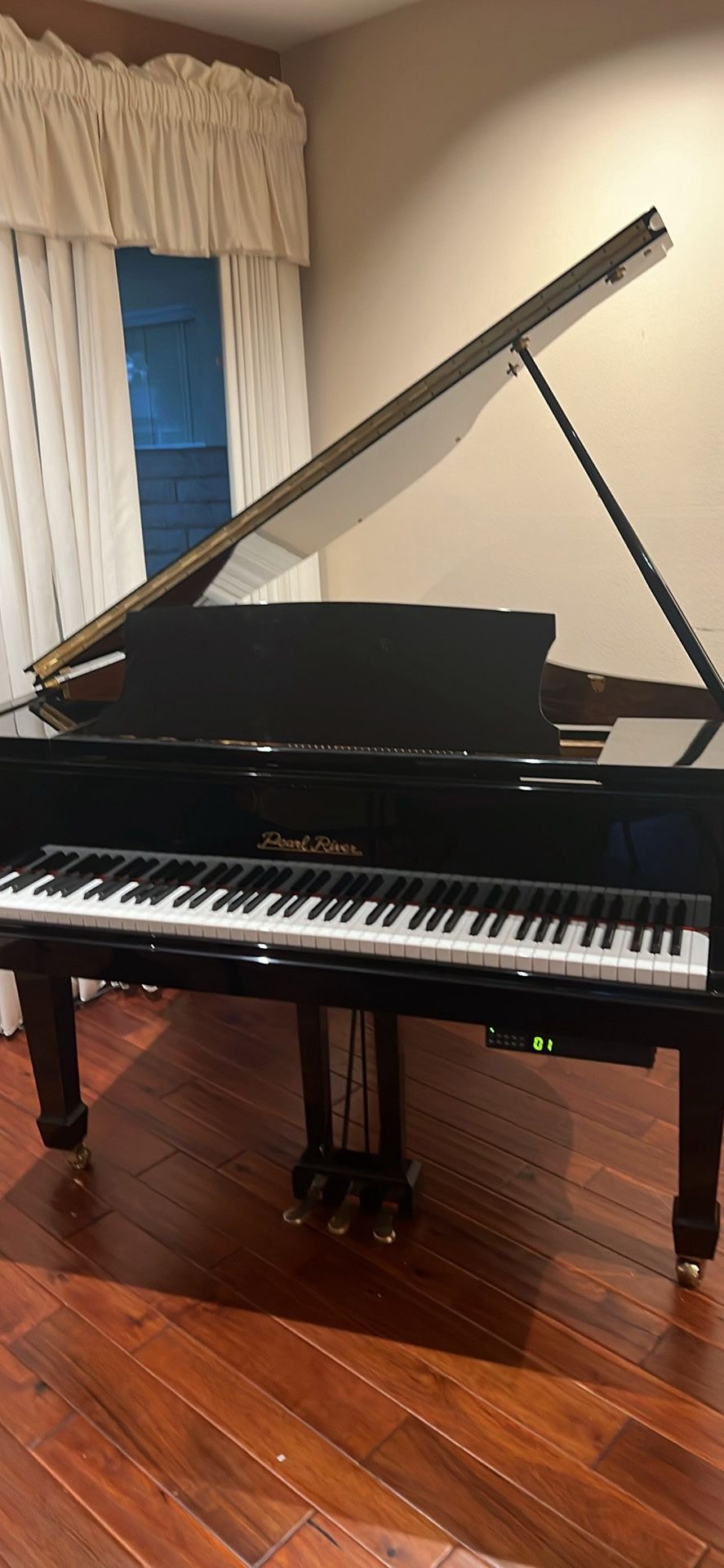 Baby grand piano with player. system. like new