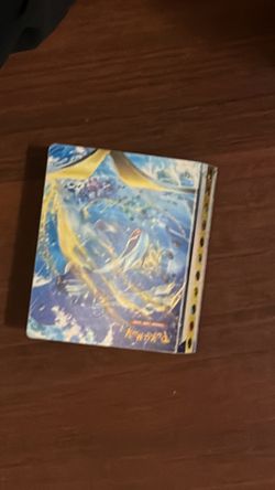 The Pokémon book and all of the cards the total26