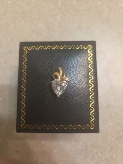 14 k gold pendant.  Weight is 1.8 grams