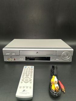 Zenith, VCR with remote and cable.  Works fine.