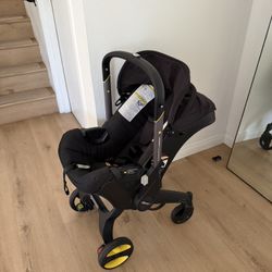 Doona Car Seat And Stroller Nitro Black Travel Baby